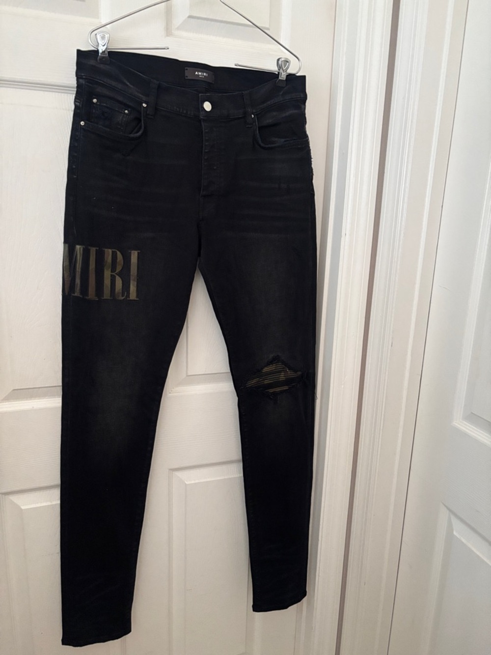 AMIRI Black Skinny Jeans with Logo Print